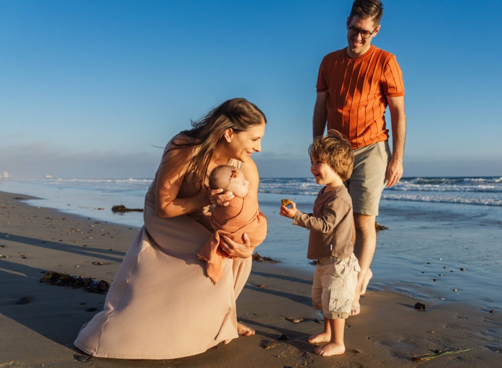 Parents and children laughing together at a Culver City fall photoshoot