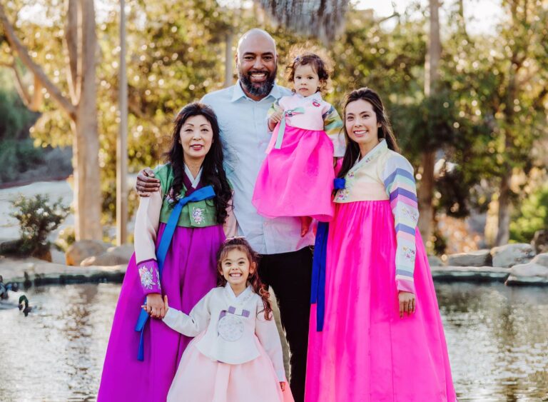 Baby in a traditional hanbok during a Korean first birthday Doljanchi session in Los Angeles